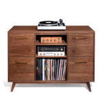 A brown Atocha Design record cabinet with open drawers showing LPs, a turntable on top, and shelves with various record albums.